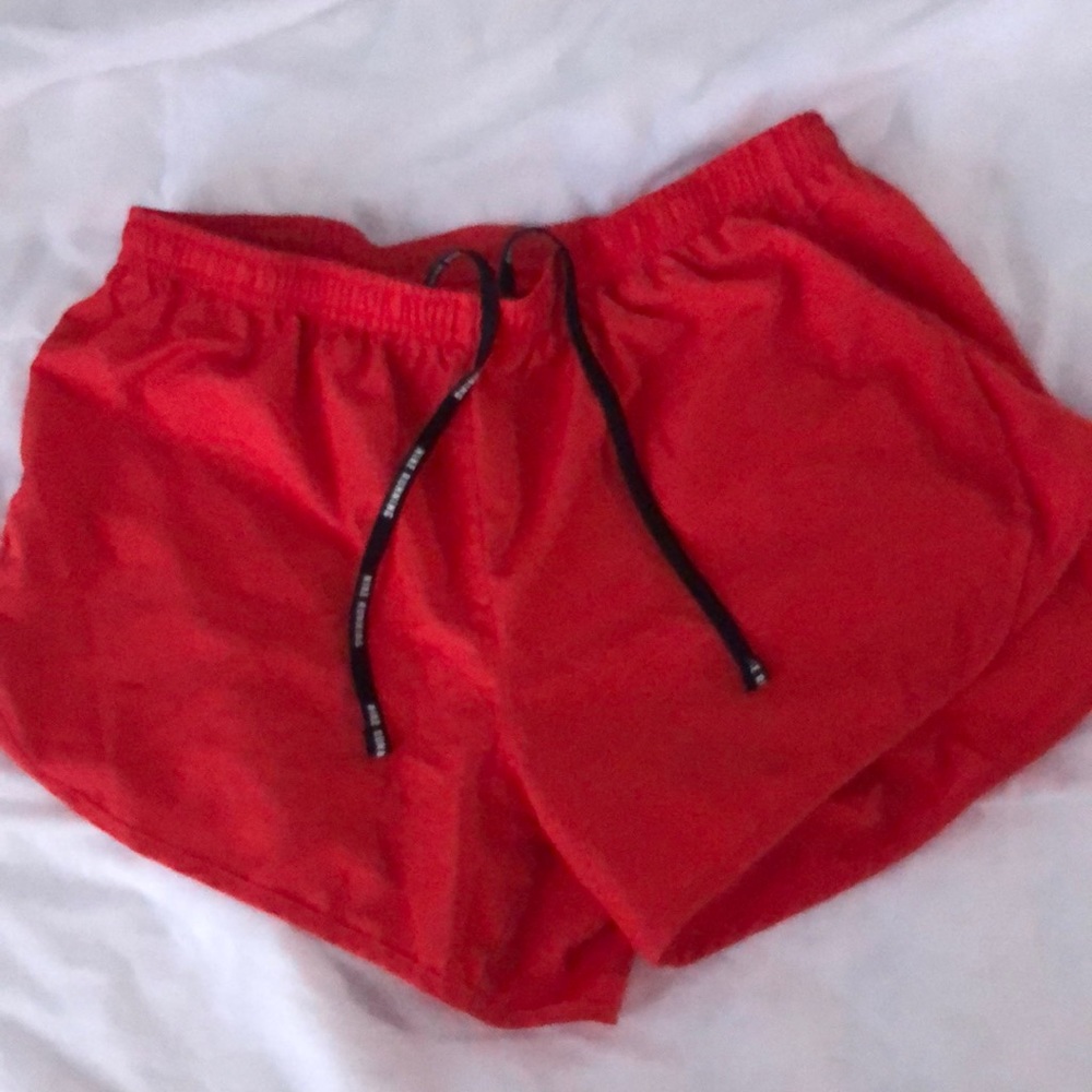 Nike red running dri-fit shorts